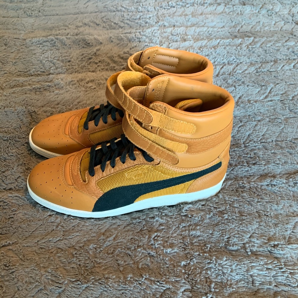 Puma High tops. Brand new. Never worn.